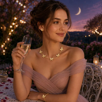 Ensemble de bijoux en acier inoxydable doré avec collier, bracelet et boucles d'oreilles papillon, ailes scintillantes, chaîne câble, clous d'oreilles, pour femmes, vente en gros, personnalisable OEM