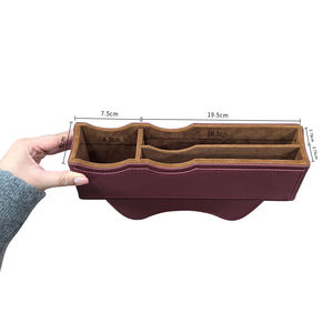 Caja de almacenamiento de asiento de coche de cuero PU de alta calidad, organizador de asiento lateral de estilo lujoso para accesorios de coche y relleno de huecos - Product Image 1