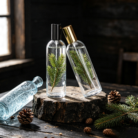 Desain Baru Botol Kaca Parfum Silinder Tinggi Tipis Bening 100ml Kosong dengan Atomizer Bertekanan 100pcs.