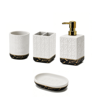 Ensemble de salle de bain en céramique de luxe moderne en cinq pièces, base en marbre, motif géométrique blanc et or, distributeur de savon écologique