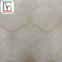 Tissu de dentelle africaine de luxe en tulle brodé de perles blanches et de sequins, lourdement perlé, pour robes de mariée