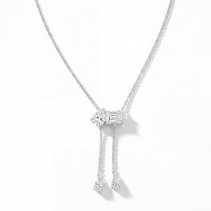 Colgante moderno de diamante cultivado en laboratorio Toi et Moi con diseño único de dos piedras, elegantes borlas de cadena y diamante talla pera engastado en punta. - Product Image 1