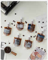 Petit sachet de café personnalisé de 50ml pochette à bec verseur pour boisson de café avec buse d'aspiration pochette transparente debout