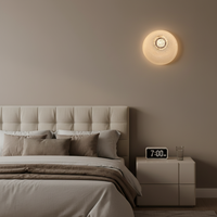 Applique murale LED dorée moderne, en aluminium texturé circulaire, luminaire à intensité variable pour salons, chambres et couloirs