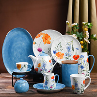 Fabricants de porcelaine personnalisé imprimé motif papillon ensemble d'assiettes en céramique vaisselle de luxe four transformation vaisselle