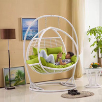 Chaise suspendue circulaire d'intérieur en fer forgé