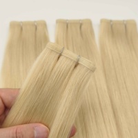 Fabricación de fábrica Precios al por mayor Doble dibujado Sin retorno Cabello Calidad superior Raw Virgin Russian Hair Extensiones de cabello de trama plana