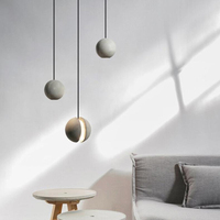 Suspension LED sphérique en béton style Wabi Sabi industriel moderne pour comptoir de restaurant