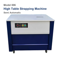 Machine à cerclage semi-automatique 006 à table haute avec roues pour cartons et entrepôts d'usine