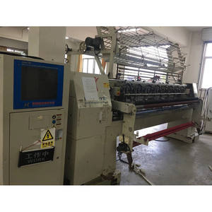 Machine à matelasser informatisée d'occasion pour textiles de maison et literie, pour la confection de couvertures matelassées - Product Image 6