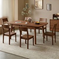 Ensemble de table à manger rectangulaire extensible en noyer avec chaises en bois à dossier creux et extension coulissante