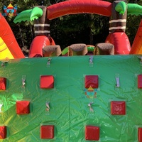 Parcours d'obstacles gonflable commercial Dinosaure 2026 avec grand toboggan en PVC pour usage public en centre commercial, idéal pour le divertissement