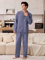 Ensemble de pyjama deux pièces décontracté et ample pour homme en tissu tissé bleu à rayures verticales, idéal pour toutes les saisons