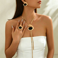 Parure de bijoux fantaisie pour femme, motif spirale irrégulière, plaqué or et argent, avec collier, boucles d'oreilles et bague, en résine noire géométrique, pour soirée
