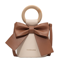Vente en gros de sacs à main Fashion Girls Drawstring Mini Bucket Lolita Bag Single Shoulder avec poignée ronde et nœud