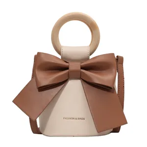 Vente en gros de sacs à main Fashion Girls Drawstring Mini Bucket Lolita Bag Single Shoulder avec poignée ronde et nœud - Product Image 2