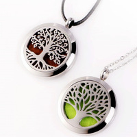 Diffuseur d'huile essentielle d'aromathérapie d'acier inoxydable collier d'arbre creux désodorisant de conception pour des cadeaux