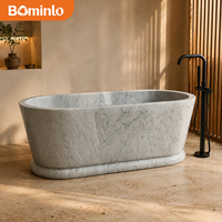 Baignoire ovale autoportante en marbre blanc veiné gris, monobloc massif avec socle, pour hôtel, villa, salle de bain
