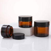 Vente en gros de pots vides en verre ambré 5g10g 20g 25g 30g 50g 100g pour crème de soin de la peau et emballage cosmétique avec couvercle noir