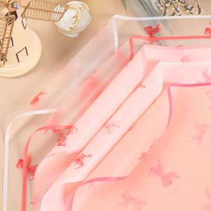New Design 58*58cm/pcs Red Bowknot <b>Pattern</b> Printed Flower Wrapping <b>Paper</b> Waterproof Plastic Bouquet Packaging <b>Paper</b> - Product Image 1