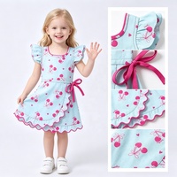 Robe débardeur à imprimé fruits mignons pour petites filles, avec volants aux épaules, ourlet festonné et nœud papillon, idéale pour les vacances et les jeux des enfants