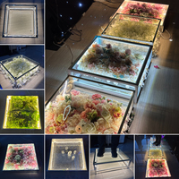 Scène de danse LED transparente pour mariage et événements, avec décor floral intégré