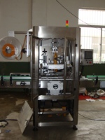 Machine d'étiquetage de manchons pour bouteilles, canettes, barils (emballages plastiques/verre)