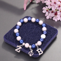 Blanc Bleu Perle Sororité Zeta Phi Beta Charms Mode Femmes Bracelet Élastique avec Étiquette ZOB pour Cadeau Principalement en Alliage