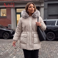 Parka mi-longue grande taille avec col en fausse fourrure et taille ajustable à cordon