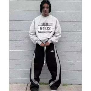 กางเกงกีฬาลำลองทรงหลวมทรงตรงเข้ารูปสำหรับผู้ชายกางเกงแฟชั่นอินเทรนด์และอเนกประสงค์สำหรับใส่ข้างนอก - Product Image 1