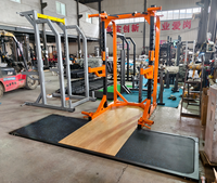 Rack de musculation multifonctionnel à charge par plaques pour demi-squat, idéal pour les clubs de fitness et l'entraînement de force