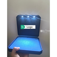 Boîte à bijoux en cuir bleu avec logo estampage or Paquet de bijoux LED de luxe Boîtes à bagues personnalisées Boîte à bijoux avec lumières