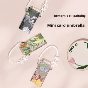Nuevo Paraguas de Bolsillo Mini Plano con Cadena de Perlas, Protección Solar UV de Vinilo al 40%, Apertura Automática de 6 Varillas, Regalo Publicitario, Doble Uso para Mujer - Product Image 1