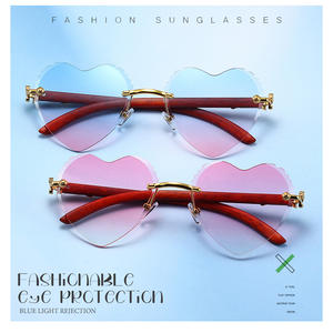 Occhiali da sole donna alla moda a forma di cuore con UV400 di alta qualità occhiali di lusso Logo personalizzato all'ingrosso per 2024 - Product Image 2