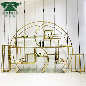 ชั้นวางบนกระจกนิรภัยกรอบสแตนเลสสีทองขนาดใหญ่แบบทันสมัยสำหรับจัดงาน - Product Image 1