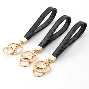 PD178 Porte-clés voiture créatif Dernières DIY PU cuir et métal corde sac pendentif accessoires promotionnels mousquetons - Product Image 1