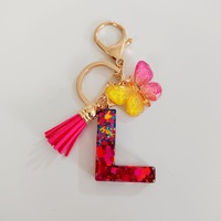 Porte-clés en résine scintillante colorée KC370 avec fleur et pompon, breloque de sac