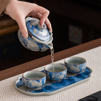 Ensemble de tasses à thé en céramique bleue et blanche à motif de pivoine, patrimoine immatériel chinois, avec coffret cadeau de luxe pour les fêtes et les cadeaux d'affaires