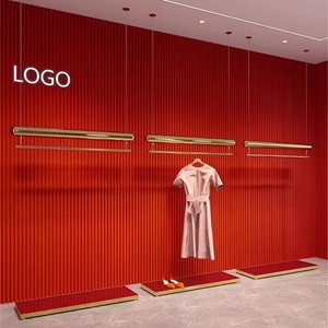 Logotipo personalizado Tienda de lujo Soporte de ropa de <span class=keywords><strong>metal</strong></span> Etiqueta Estante de exhibición de ropa Estante de ropa de oro de acero inoxidable para Boutique - Product Image 1