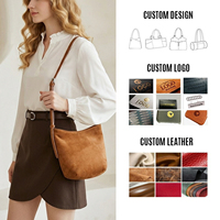 Sac seau en cuir véritable suède cognac OEM ODM pour femme, sac à bandoulière réglable personnalisé