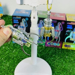 เครื่องเกมคีบตุ๊กตาขนาดเล็กแบบพกพา รุ่นใหม่มาแรง พร้อมพวงกุญแจโลหะ ของรางวัลสำหรับเด็ก - Product Image 5