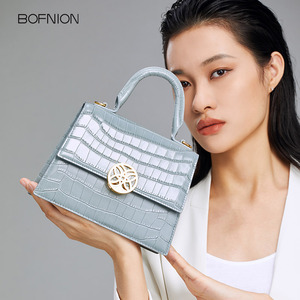 Sac à main de luxe en cuir véritable pour femme avec bandoulière – Sac de créateur durable - Product Image 1