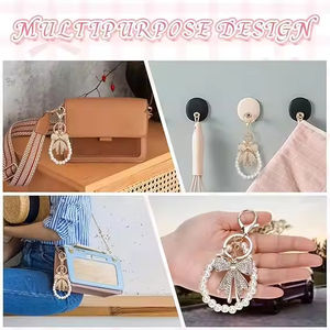 Porte-clés nœud papillon blanc avec strass, chaîne de perles d'imitation, breloque scintillante pour sac à main - Product Image 5