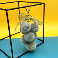 Porte-clés créatif en peluche en forme de pamplemousse, pendentif mignon pour sac, avec nœud en dentelle et boule de fourrure, pour clés de voiture