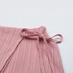 Mini pantaloni Casual giapponese e coreano per <span class=keywords><strong>donna</strong></span> pantaloni rosa a vita alta con lacci eleganti gonna corta <span class=keywords><strong>donna</strong></span> OEM/ODM - Product Image 6