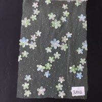 Tissu en dentelle de tulle transparent brodé de sequins et d'appliques florales 3D en gros pour robes de mariée et robes de soirée