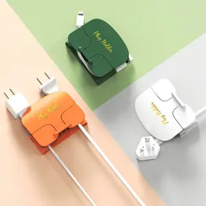 Idée de nouveau produit créatif 2022 universel sans dommage auto-adhésif téléphone portable support de chargeur mural support mural étagère de montage