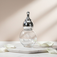 Flacon en verre transparent créatif de 50 ml en forme de gourde avec bouchon doré estampé pour huiles essentielles et essences