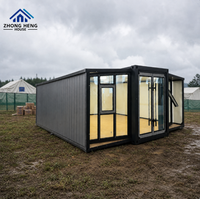 Maison préfabriquée extensible à double aile pour projets résidentiels de jardinage, avec entrée centrale, en acier, type conteneur, pour entrepôt