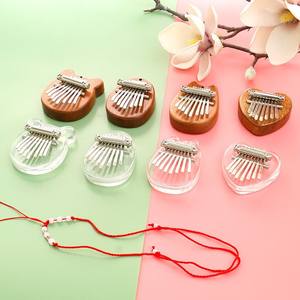 Pequeño 8 tonos Mini pulgar Piano portátil ocho tonos madera Kalimba dedo Piano música Accesorios - Product Image 1